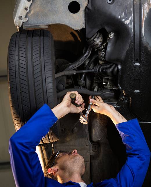 mechanic-servicing-carSuspension-Alignment-Services-